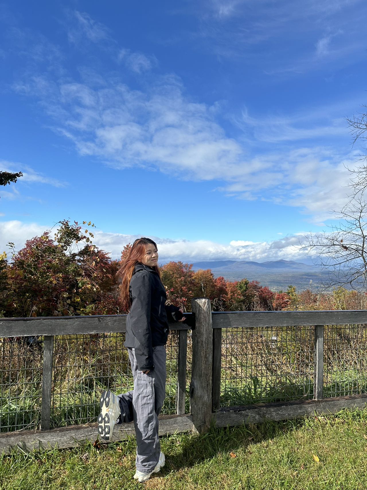 Rebecca at a mountain lookout in autumn